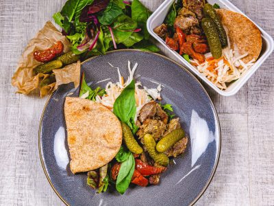 A low calorie Food Fit meal containing lamb shish pittas on a blue plate.