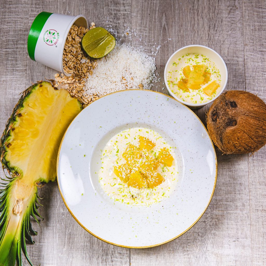 A healthy, weight loss Food Fit meal containing lime coconut overnight oats in a white bowl.